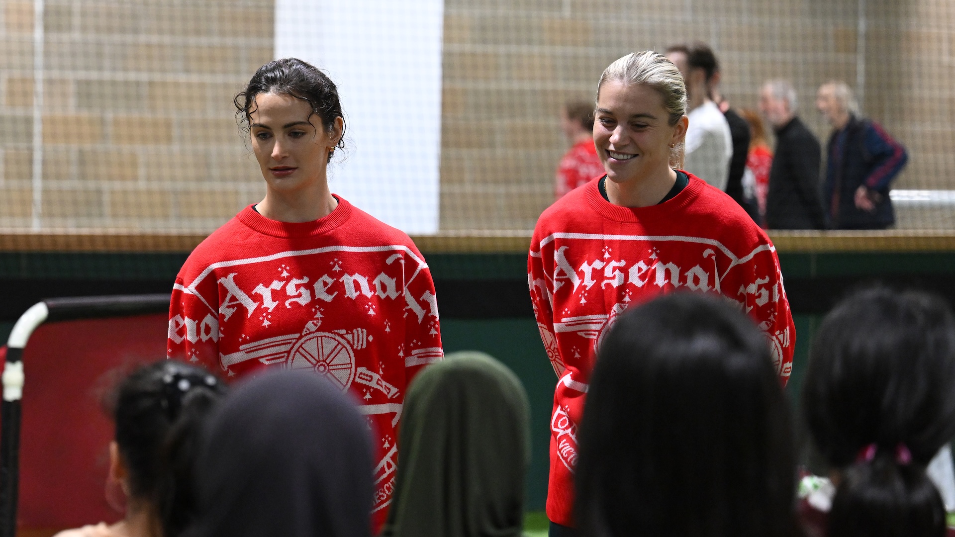 Arsenal's Emily Fox and Alessia Russo visit at the Community Hub at Emirates Stadium.
