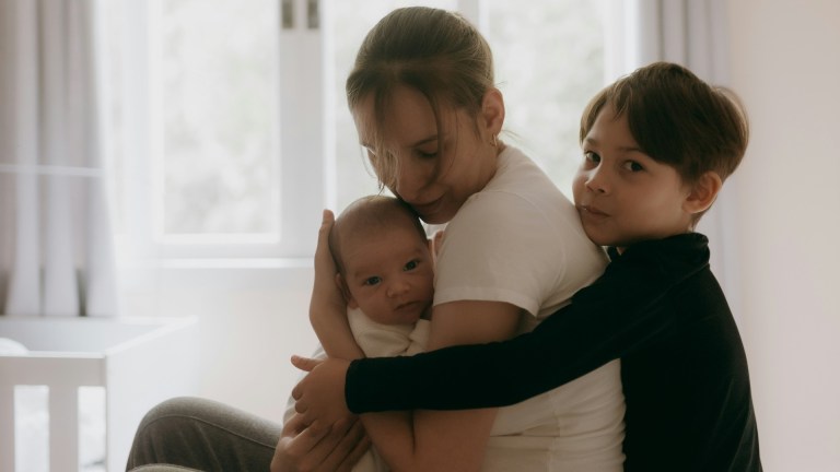A stock image of a mother and two children. Image: Unsplash