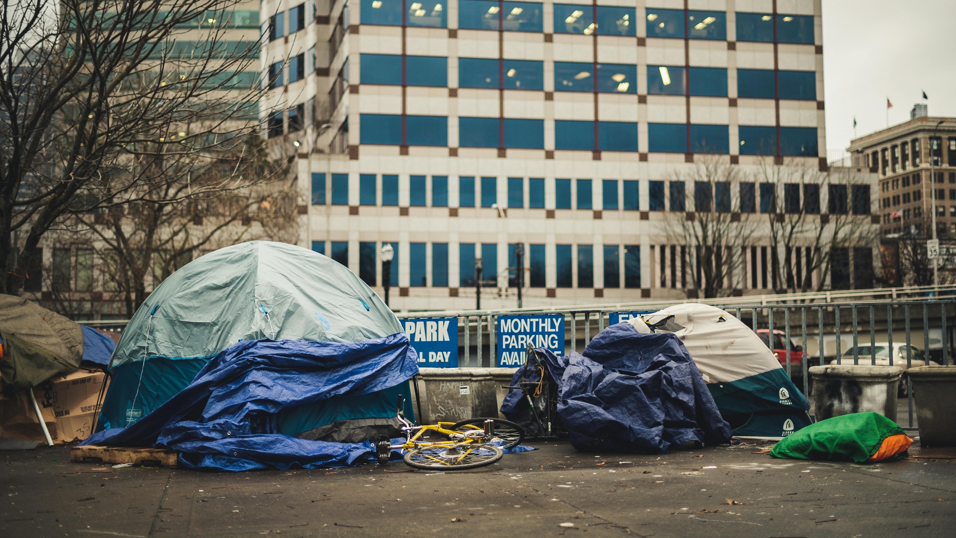 homeless tents in front of a building