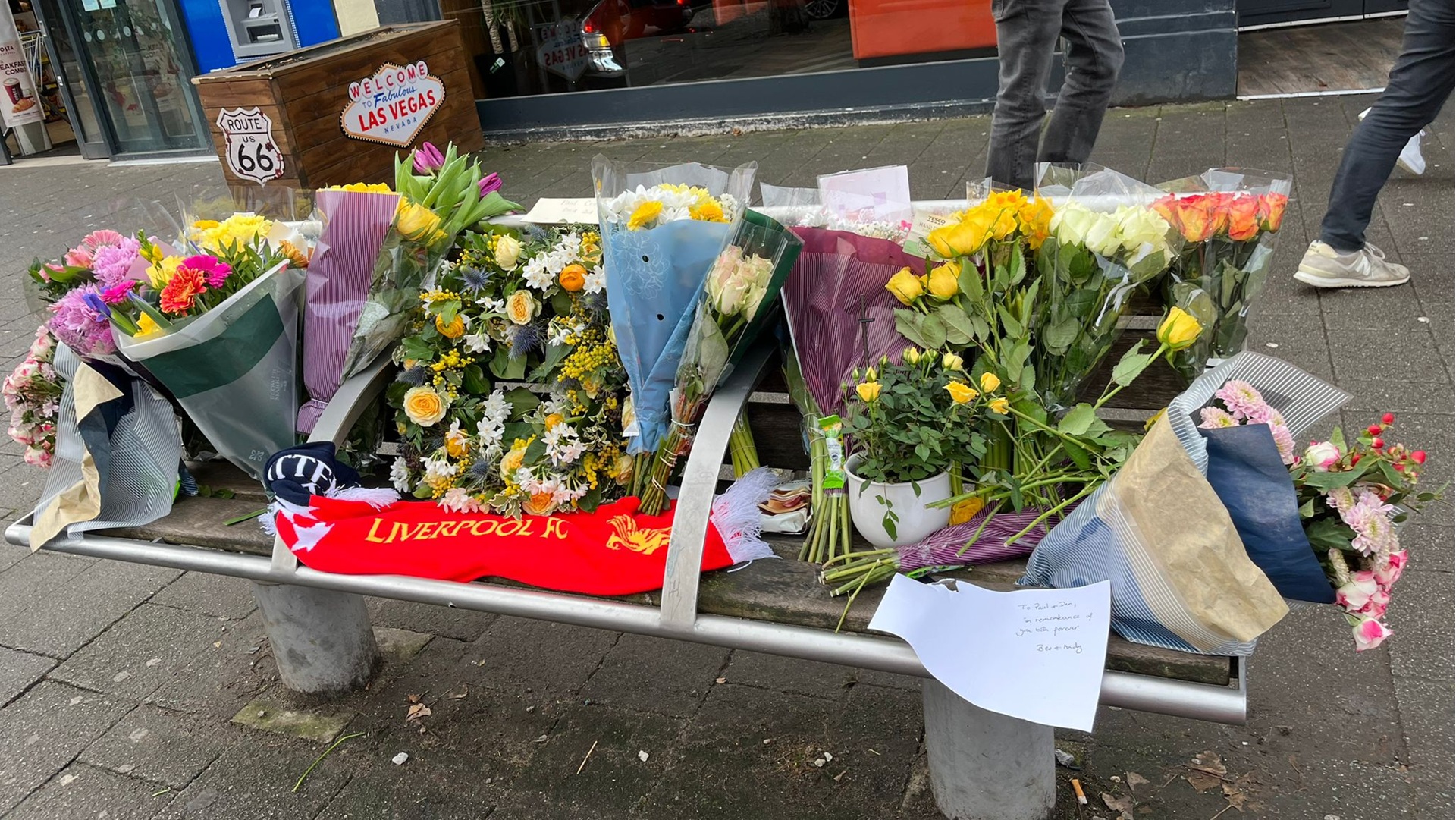 Floral tributes and messages have been left on 'Paul's bench' in Summertown, Oxford