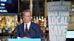 Reform UK leader Nigel Farage in a pub