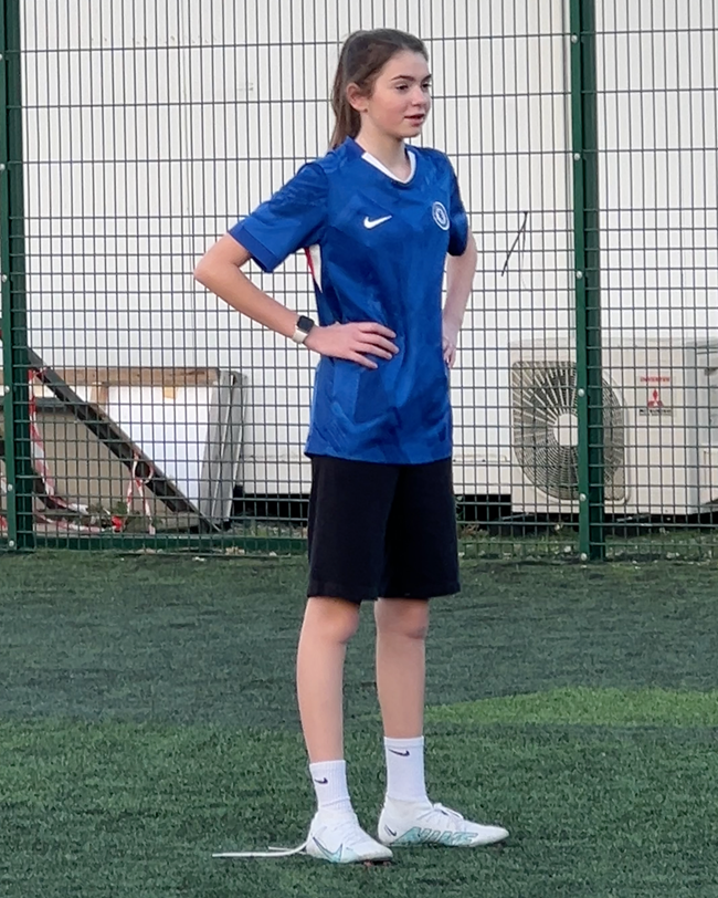 Lola in a Chelsea kit at Kingston Carers Network