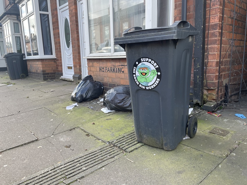 A &ldquo;support the Brum bin workers&rdquo; sign on a bin in Birmingham