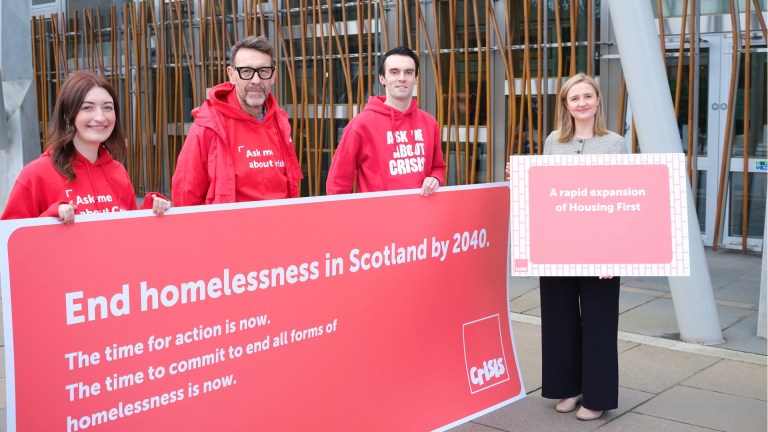Crisis Scotland representatives show cabinet secretary for housing Mairi McAllan the roadmap to end homelessness by 2040
