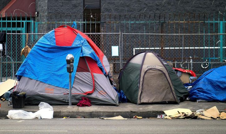 Stock image of tents on the side of a road