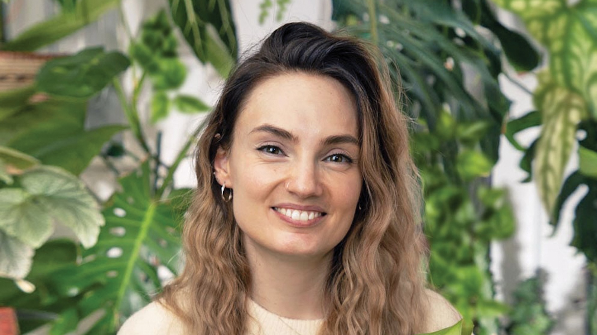 Claire Lowrie with her house plants.