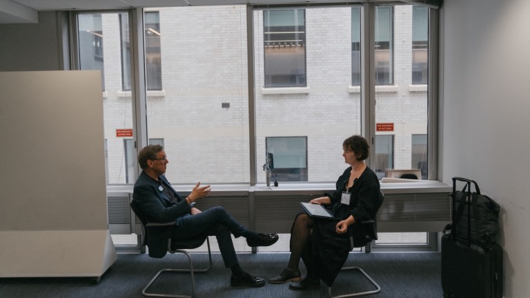 Big Issue Recruit's Catherine Parsons interviewing Alan Milburn.