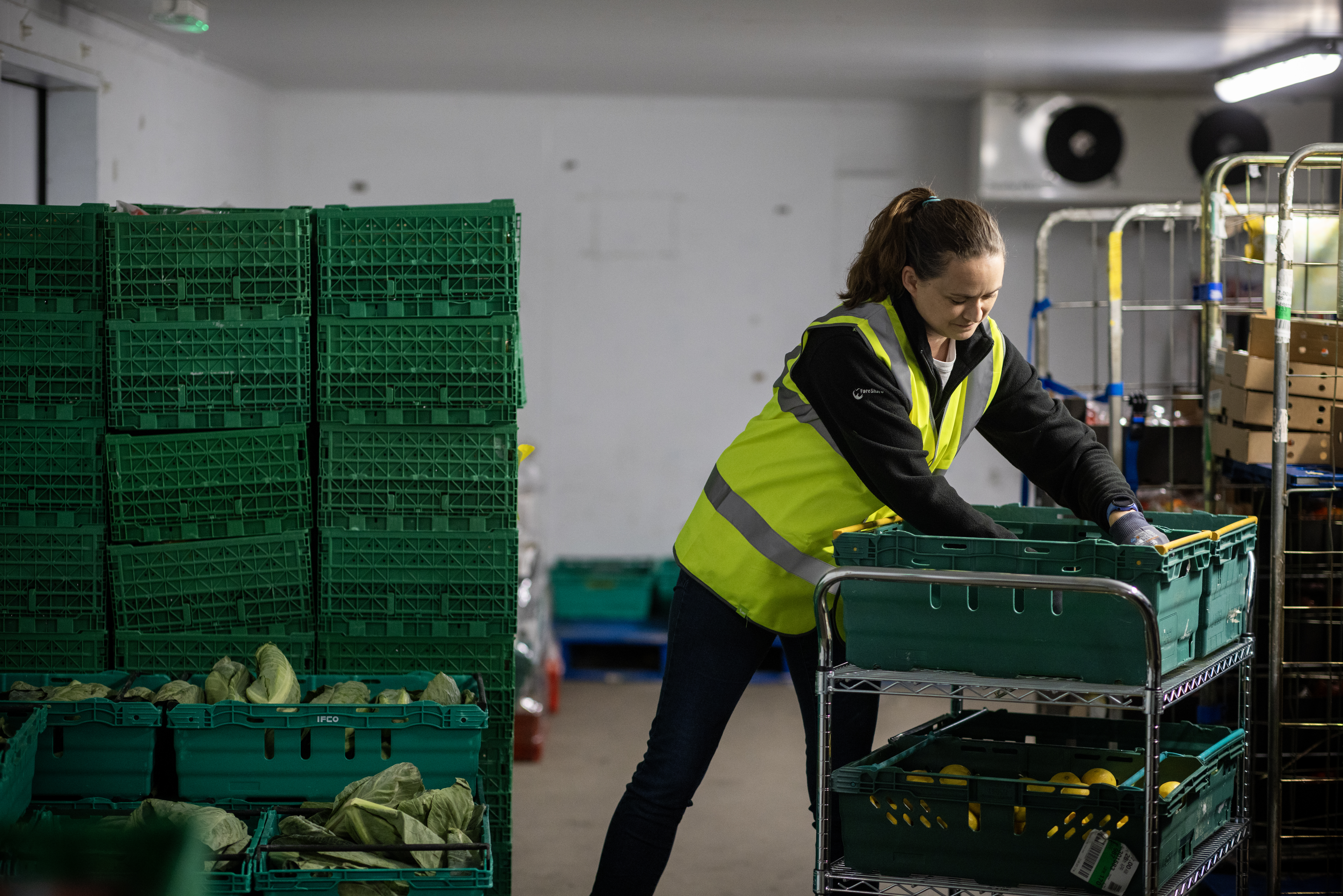 Image of a woman working at a food bank