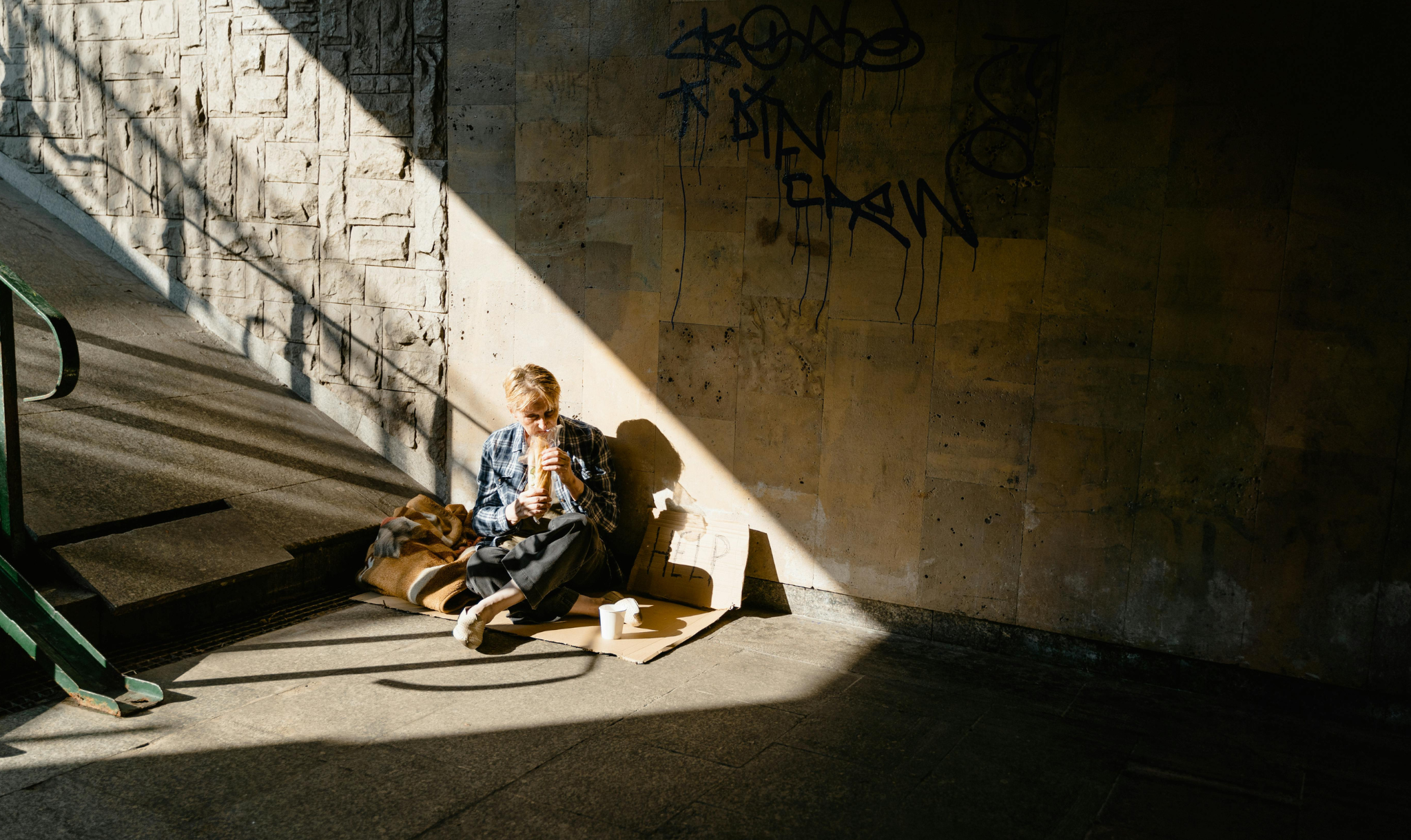 Stock image of a homeless woman