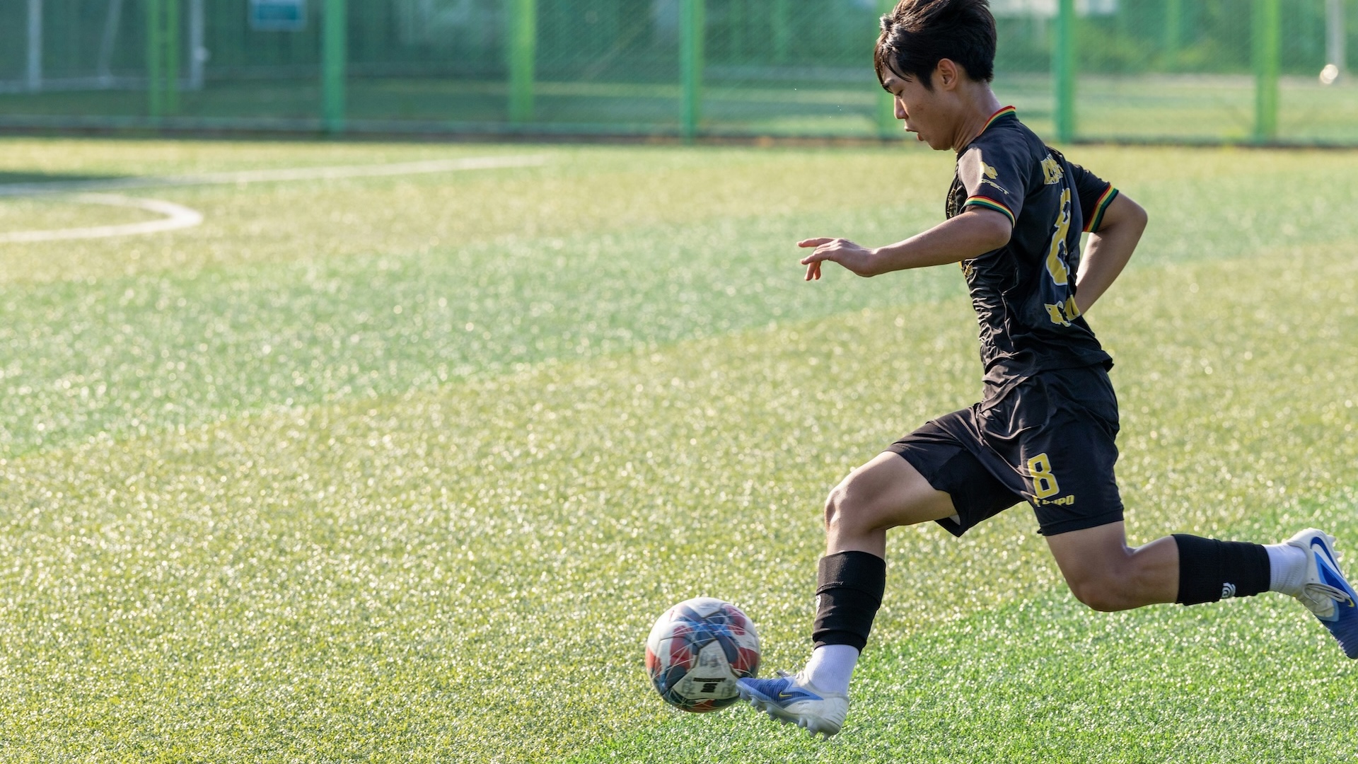 A boy playing football