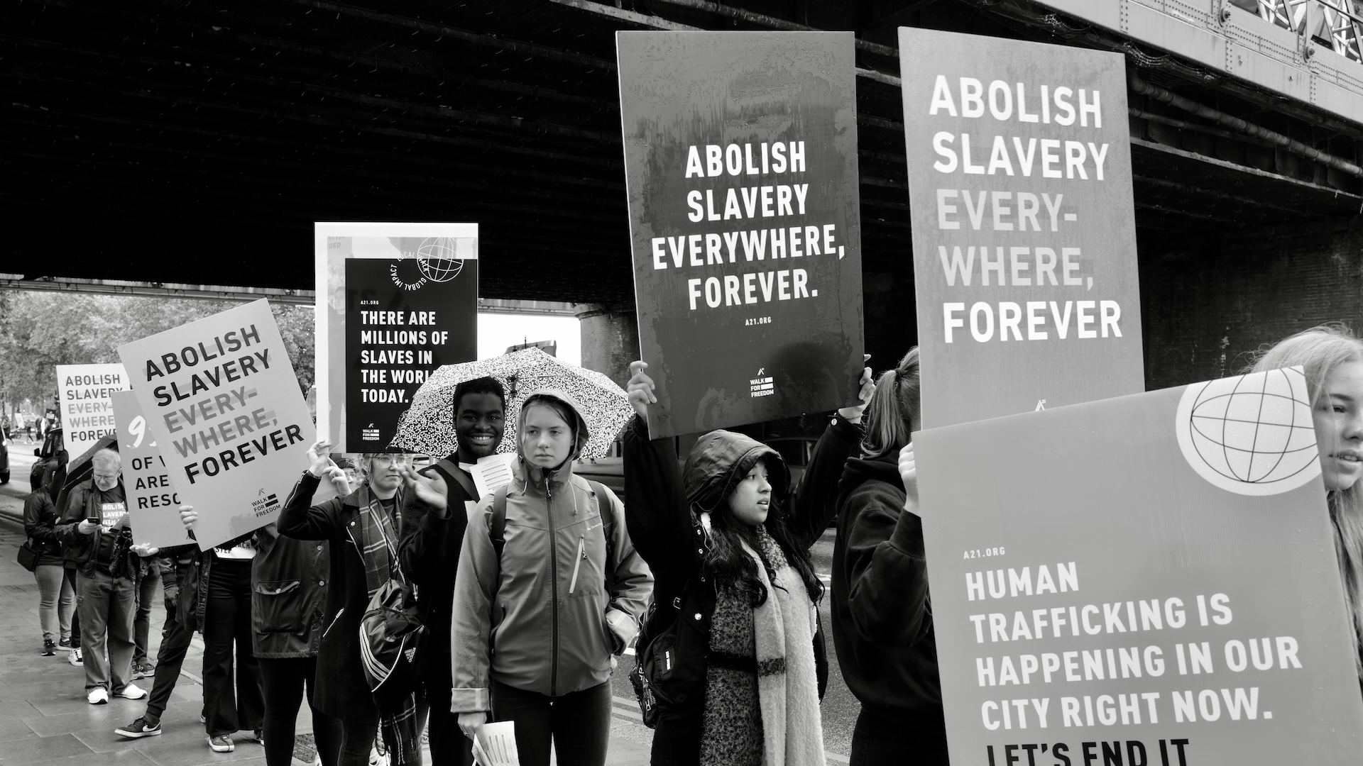 People protesting against modern slavery.
