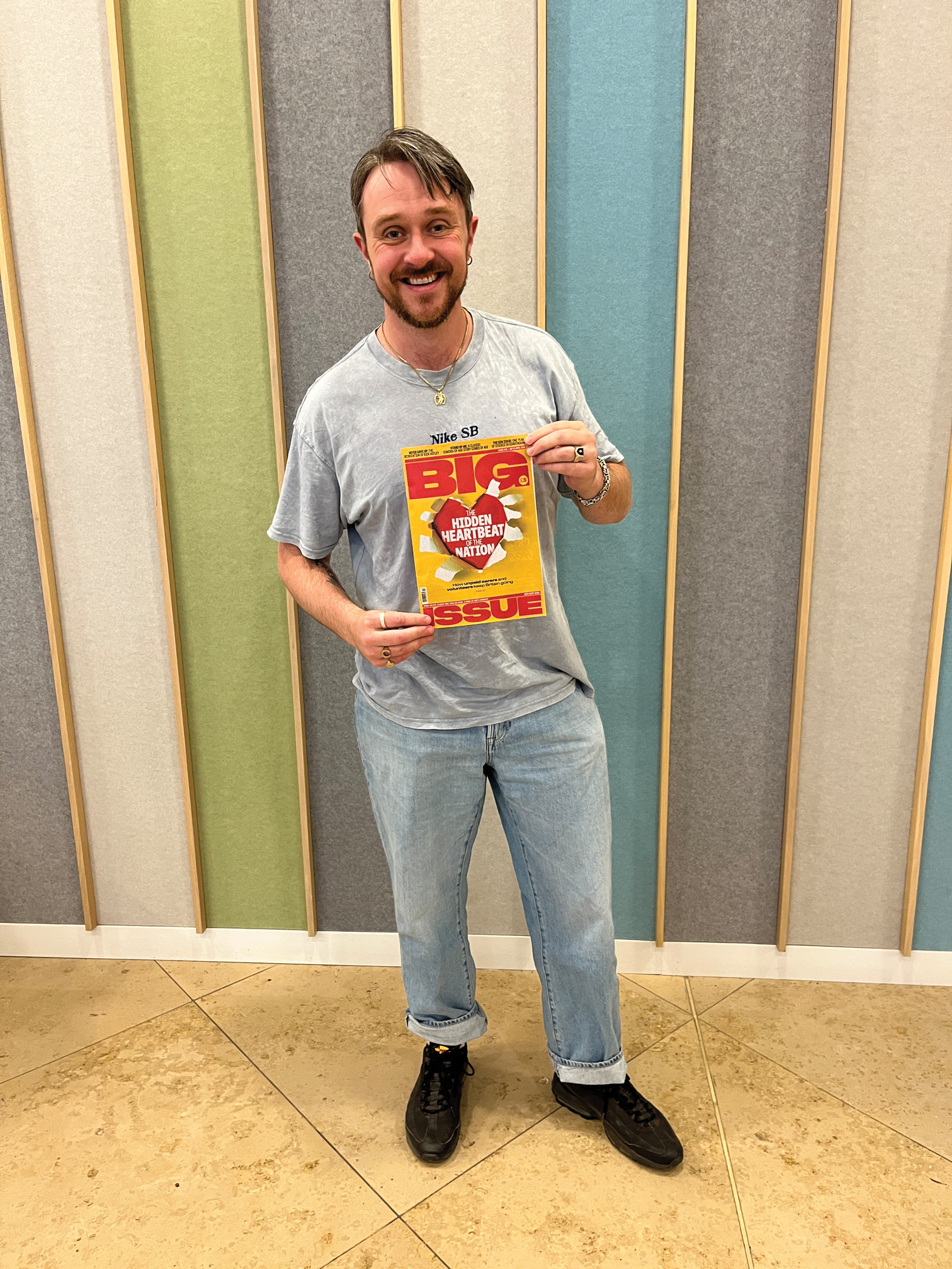 Actor Sam C Wilson with Big Issue magazine