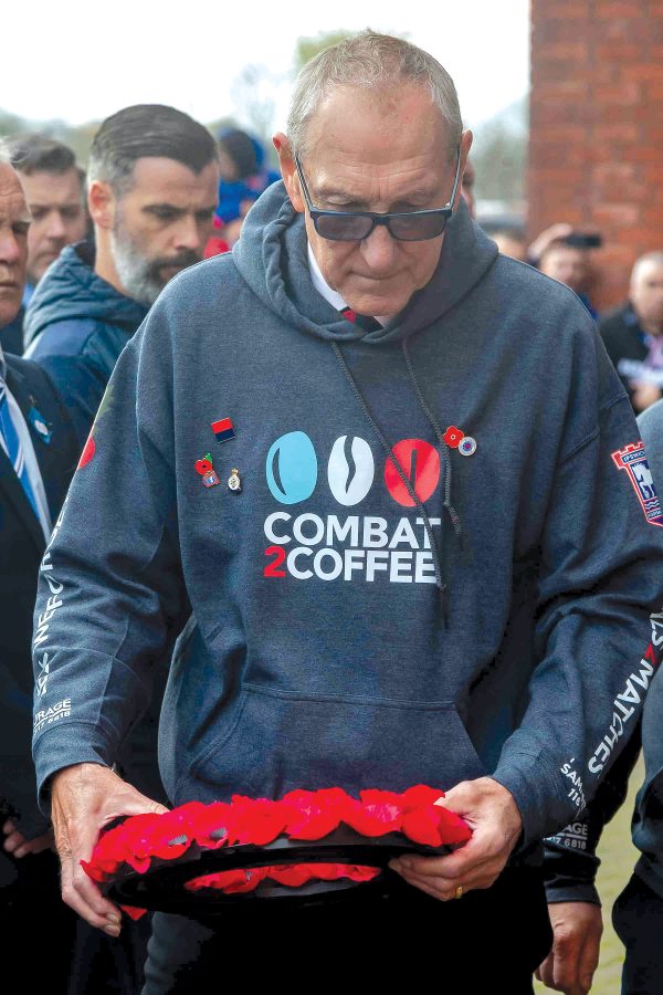 Terry Butcher lays a wreath