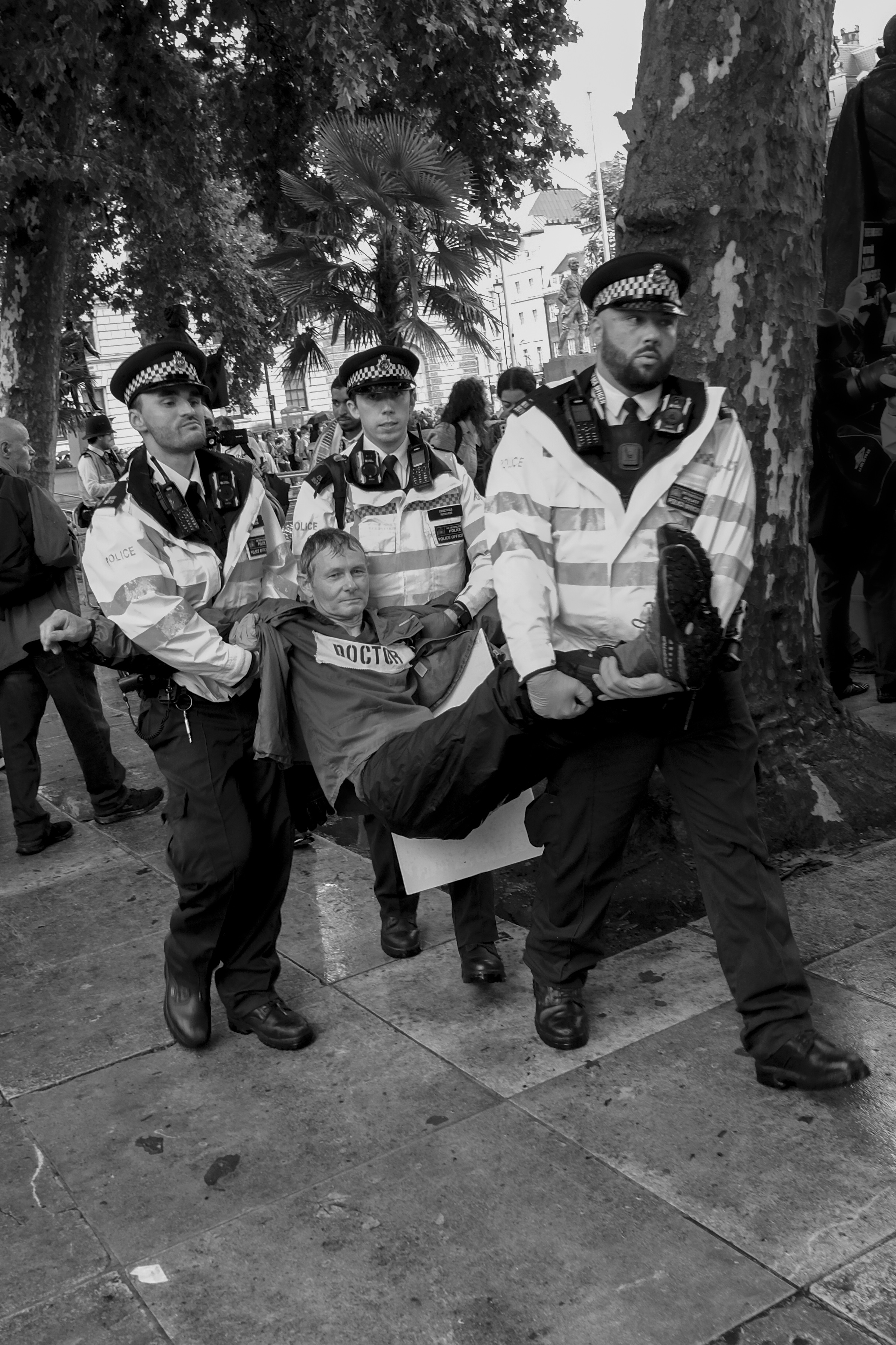 A Palestine Action activist being removed by police, photographed by Marc Davenant for his Rebellion! exhibition