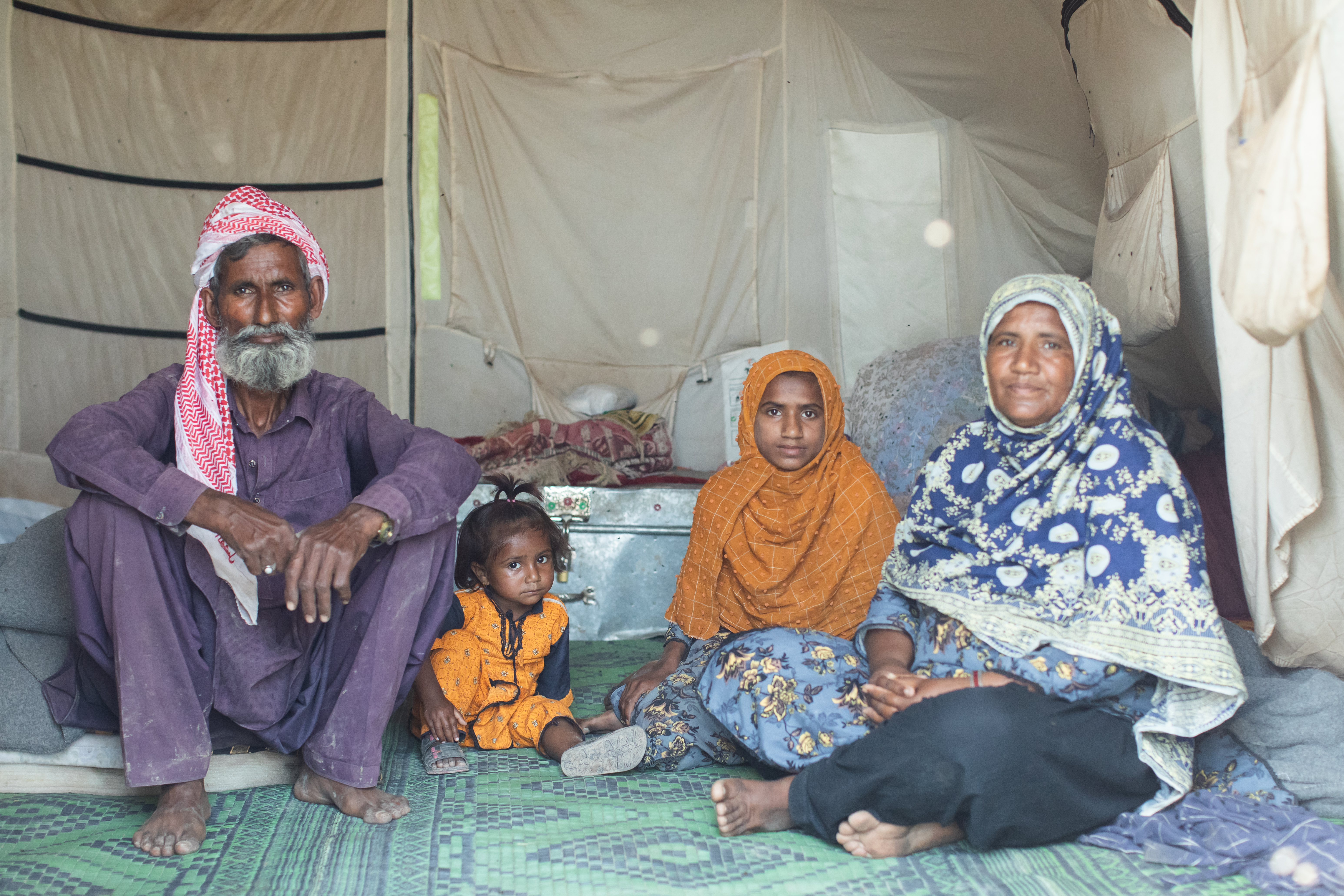 A Pakistan farmer and his family