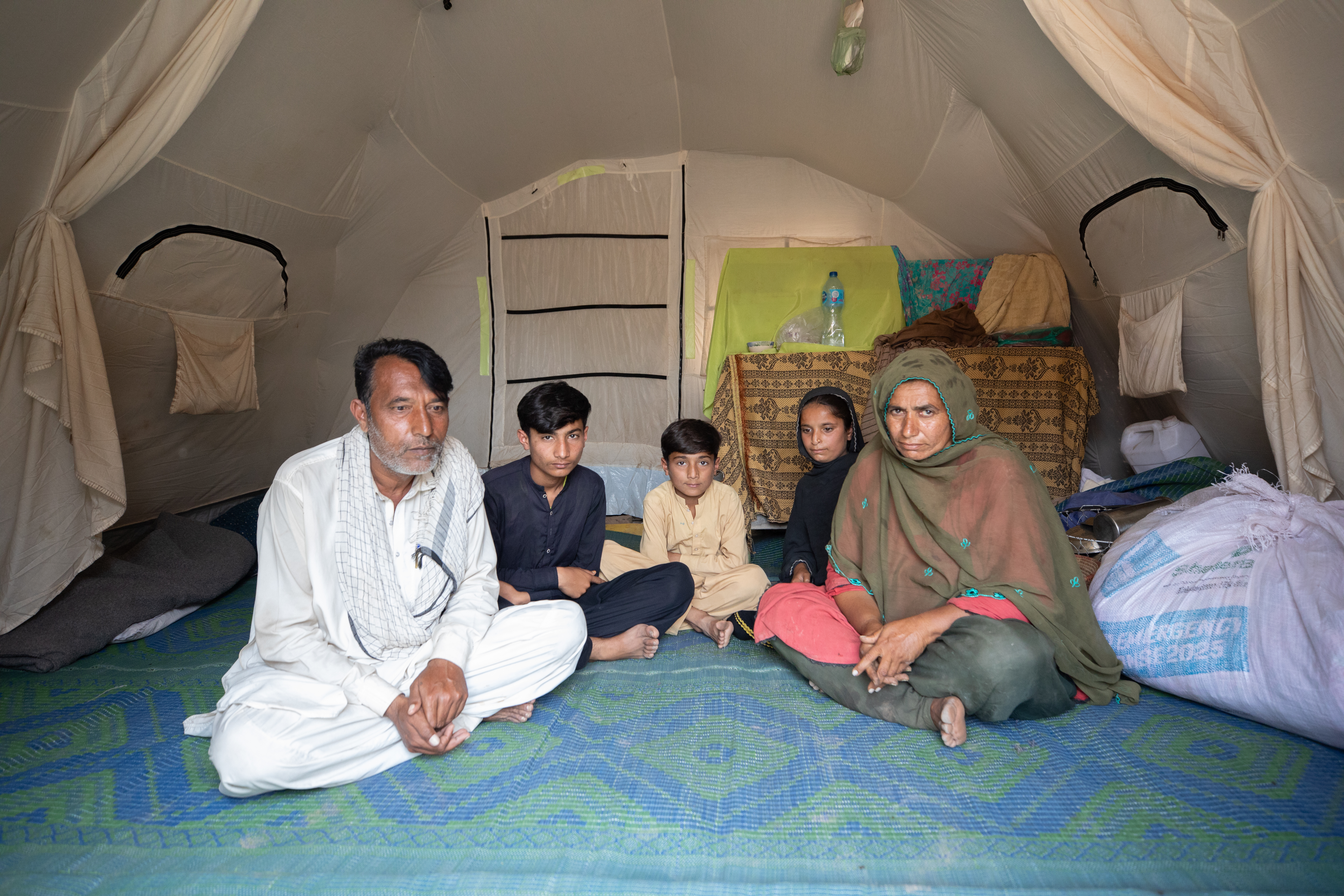 A Pakistan farmer and his family