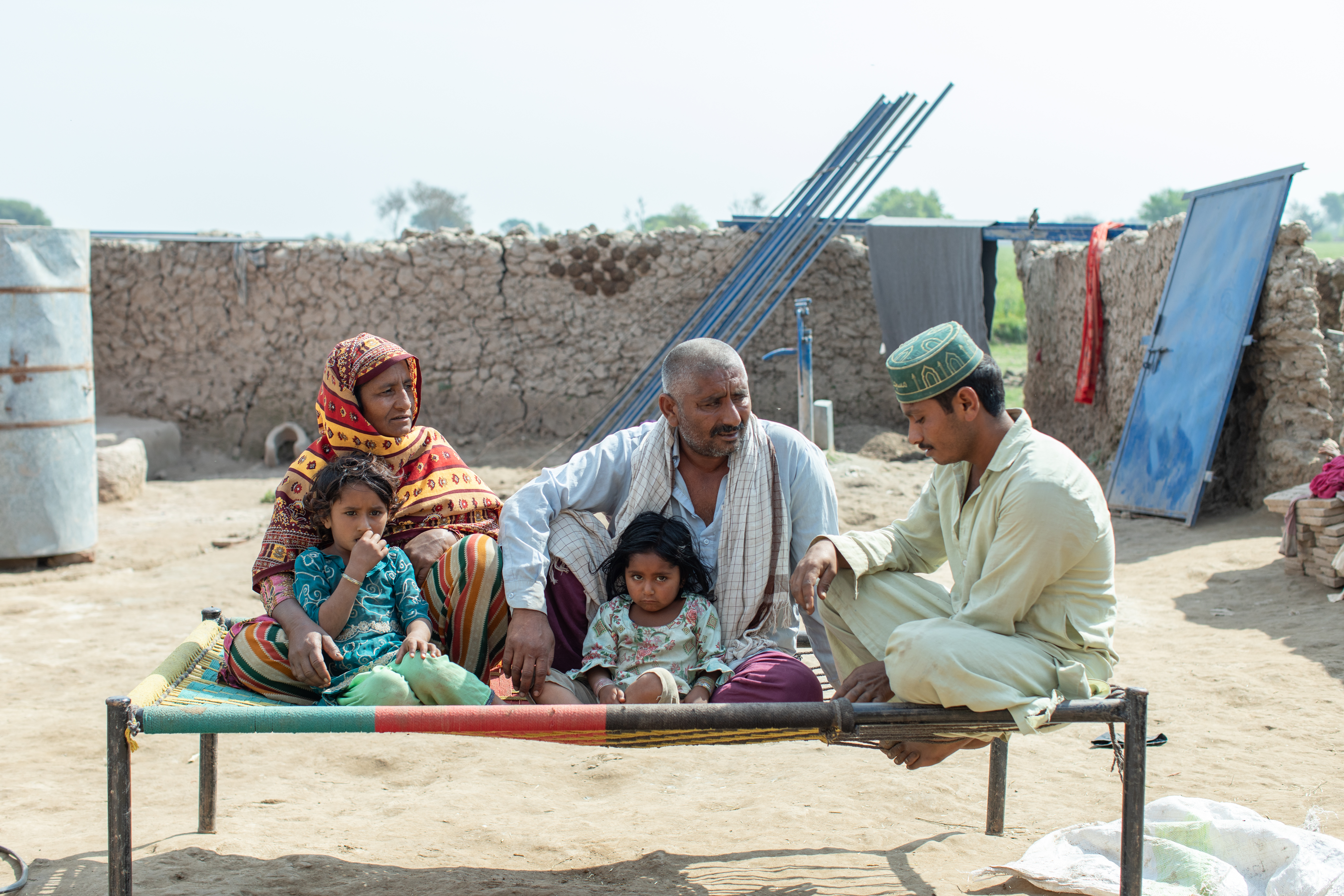A Pakistan farmer and his family