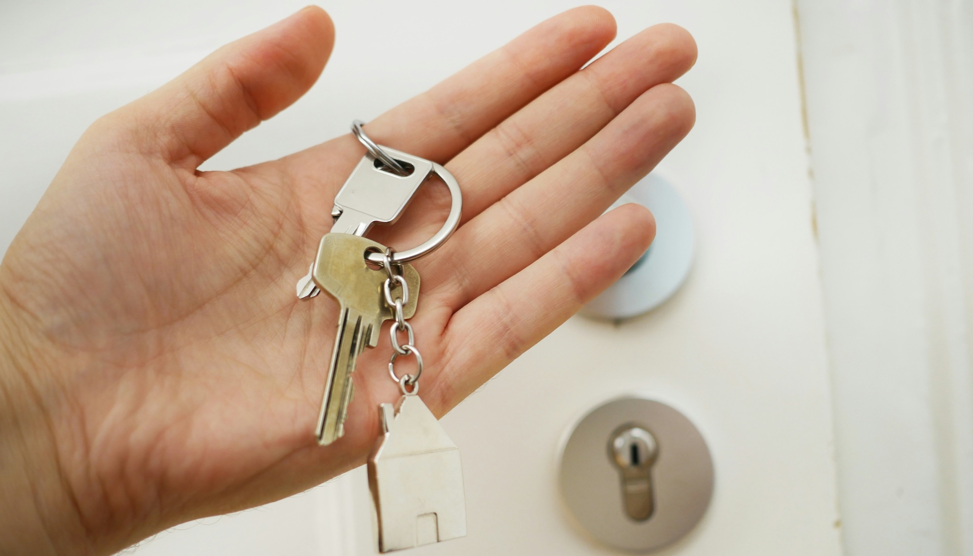 person holding keys