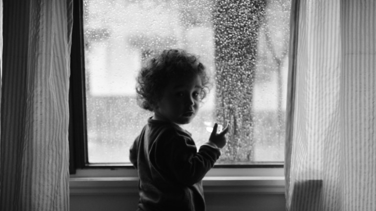 child at window