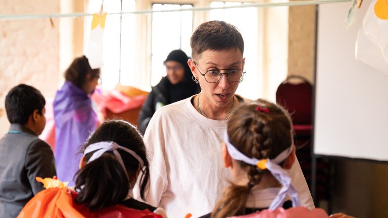 teacher with kids doing drama
