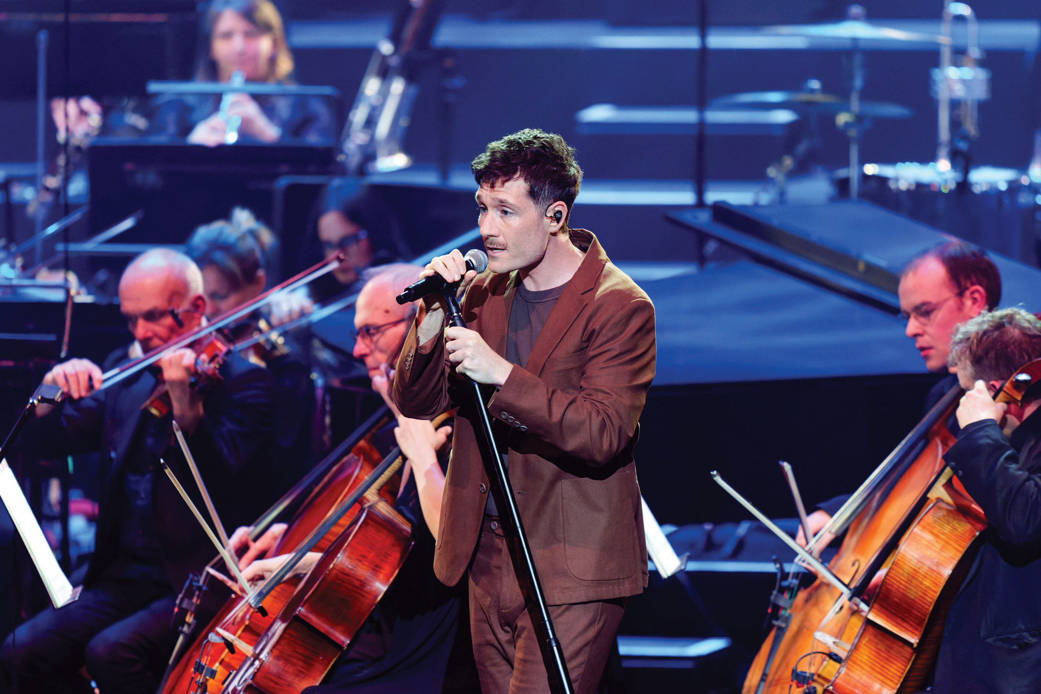 Dan Smith performing at David Attenborough's 100th birthday celebration