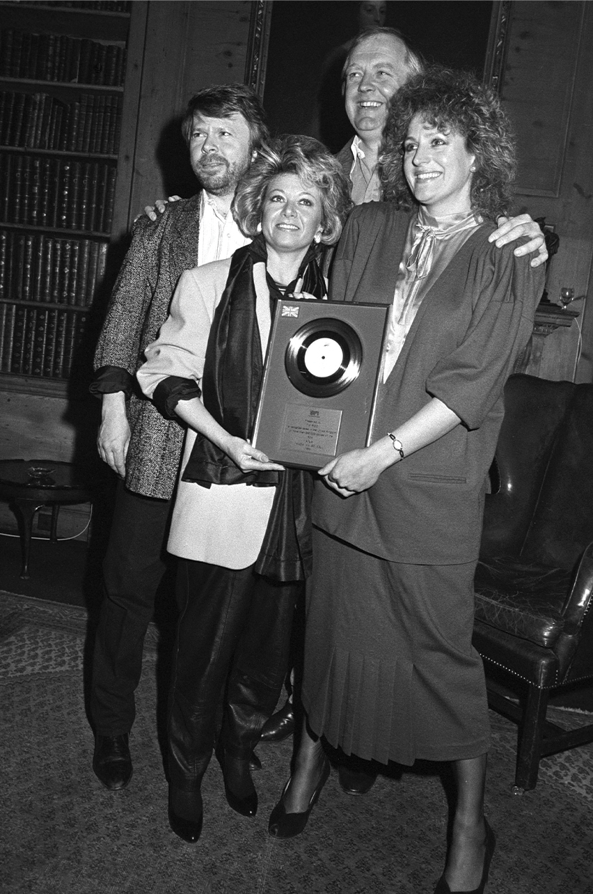 Elaine Page  receiving a silver disc in 1985 for the No 1 single I Know Him So Well from Chess. (From left) Bj&ouml;rn Ulvaeus, Elaine Paige, Tim Rice and Barbara Dickson