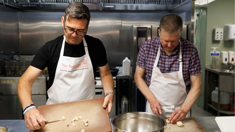 Andy Burnham volunteering at London homelessness charity The Passage on the day he was named prime minister