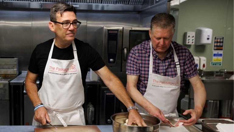 Prime minister Andy Burnham cooking at homelessness charity The Passage