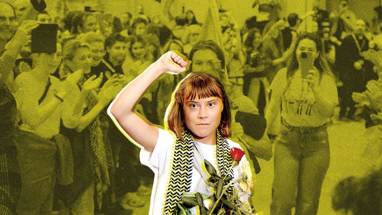 Greta Thunberg raising a fist in protest