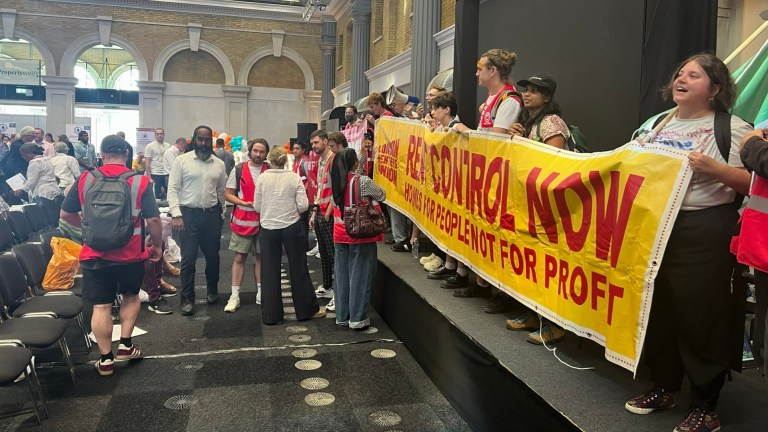 renters from ACORN and London Renters Union storm the stage at the National Landlord Investment Show to demand rent controls
