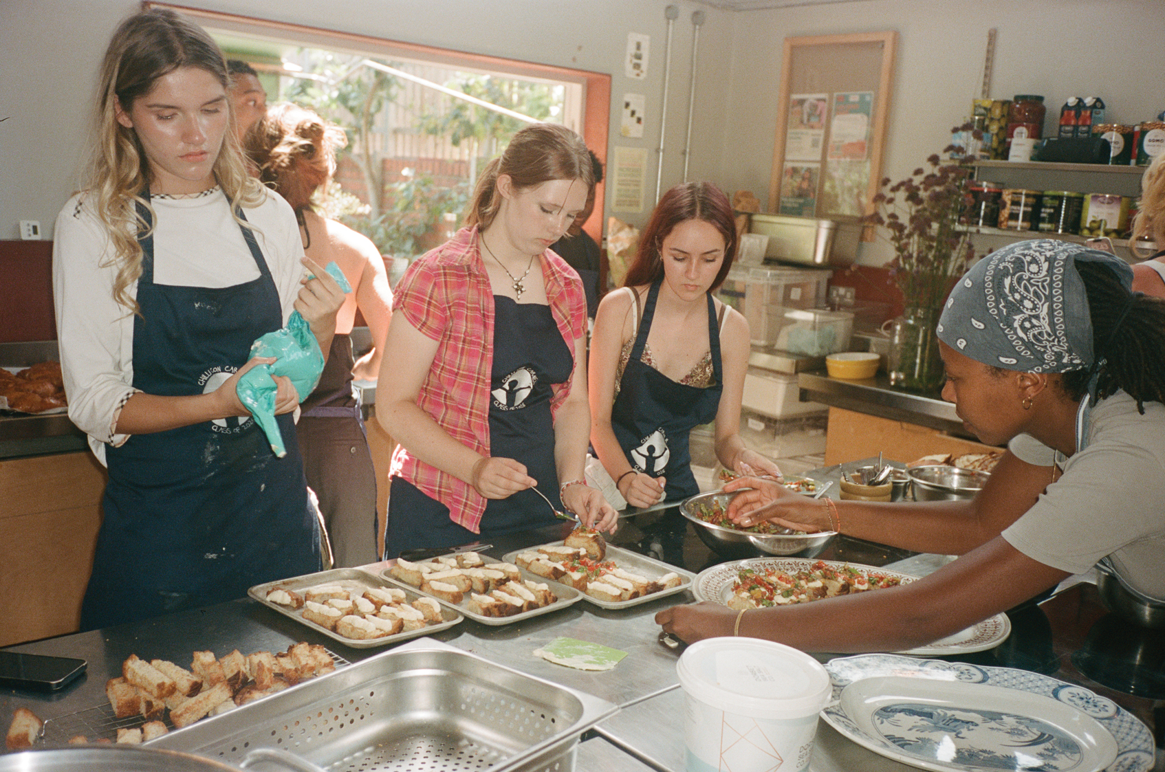 Each summer a new group of students joins the Chilli Con Carner cookery school 