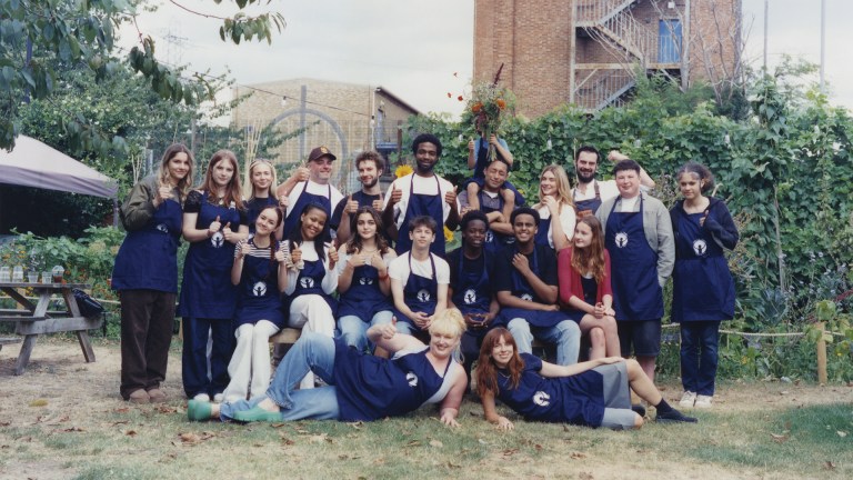 Loyle Carner with people from his cooking school Chilli Con Carner
