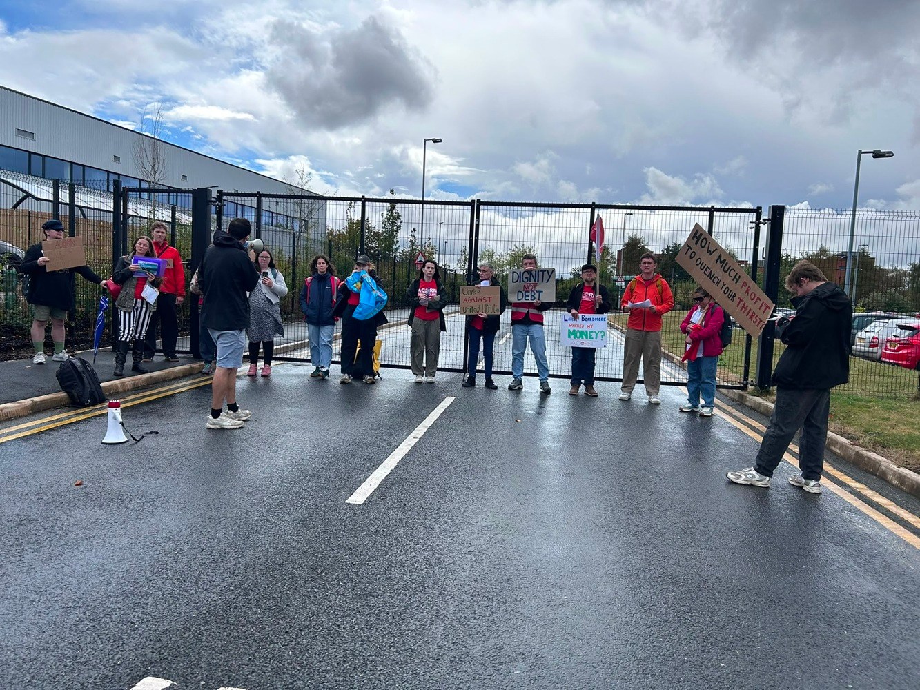 Acorn members block the road outside water company United Utilities