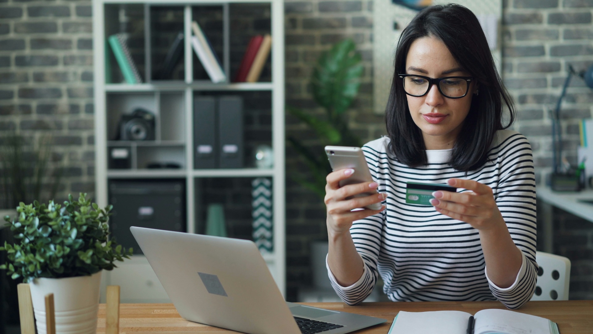 Woman using a credit card
