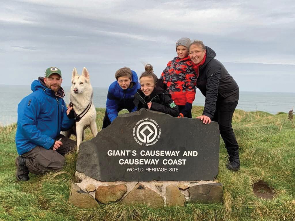 Former Big Issue vendor Dan Bleach with his family