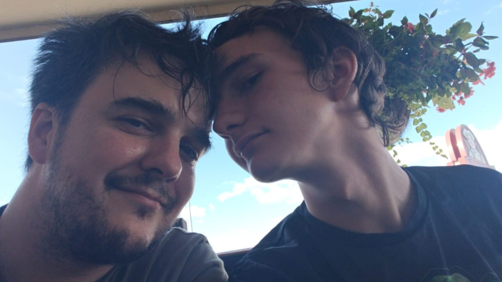 Unpaid carer Kevin Cameron and his son Tristan