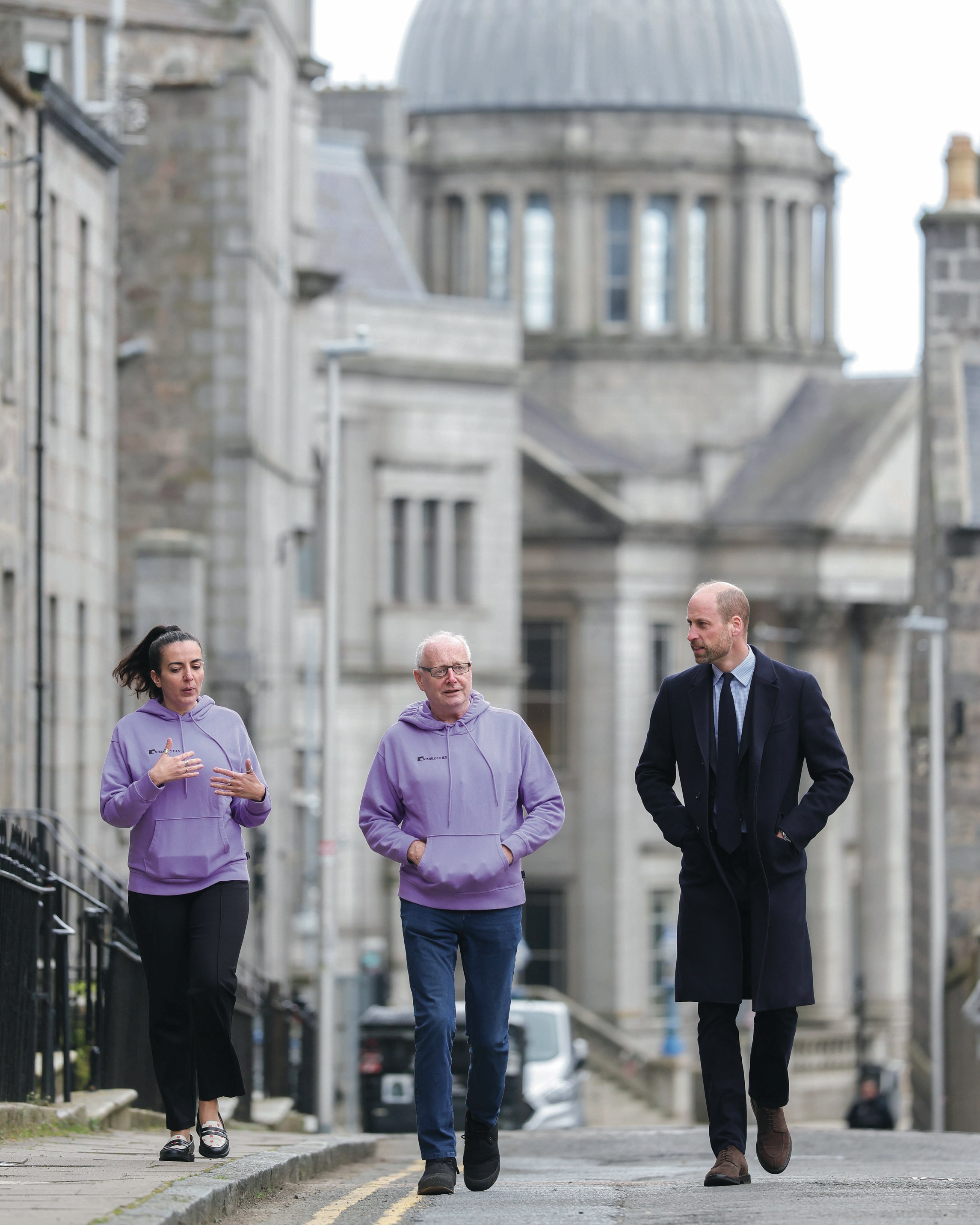 Invisible Cities tour guide Angus showing Prince William around Aberdeen