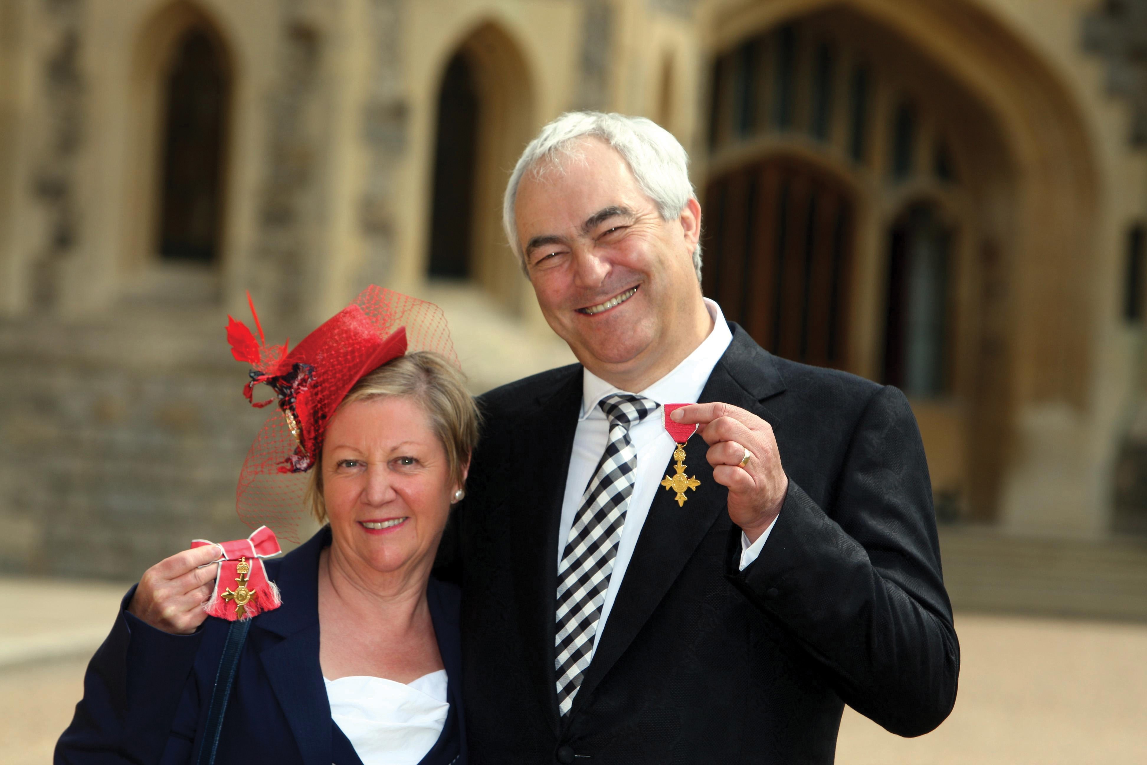 Mo and Mark Constantine after getting their OBEs at Windsor Castle in 2011