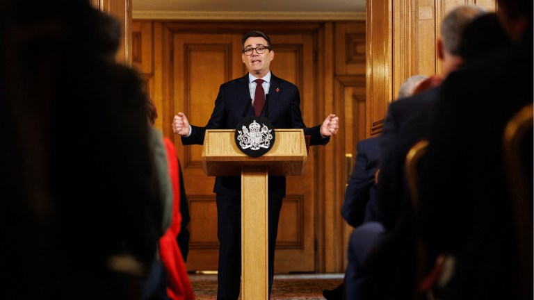 Prime Minister Andy Burnham delivers a speech as he hosts a rough sleeping summit in 10 Downing Street